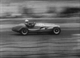 45. F2/17.20. Stirling Moss No12 in a 'B' Type ERA at speed.