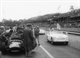 4. F2-12. Harry Schell (USA) convoy lap in an Austin Healey British GP Aintree 1957.