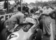 7. F2-21. Jean Behra Maserati 250F in pits at the British GP Aintree 1957.